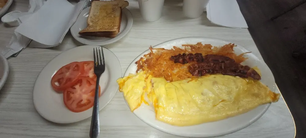 Sausage Cheese Omelet Hash Browns Side of Bacon